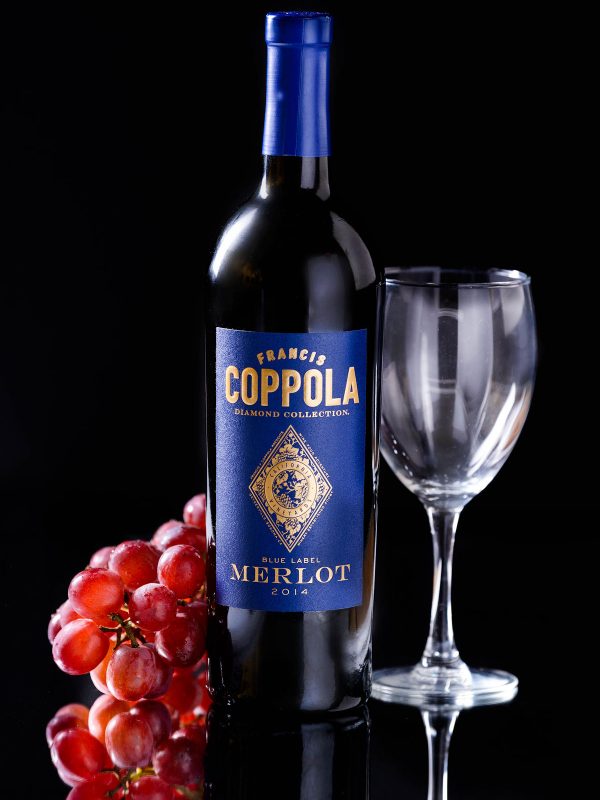 Francis Coppola Merlot Wine Bottle Grapes Product Photography